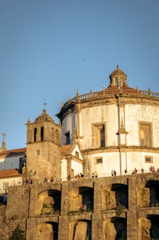 Warm evening light on Serra do Pilar Monastery, capturing Porto's iconic architecture and vibrant atmosphere.