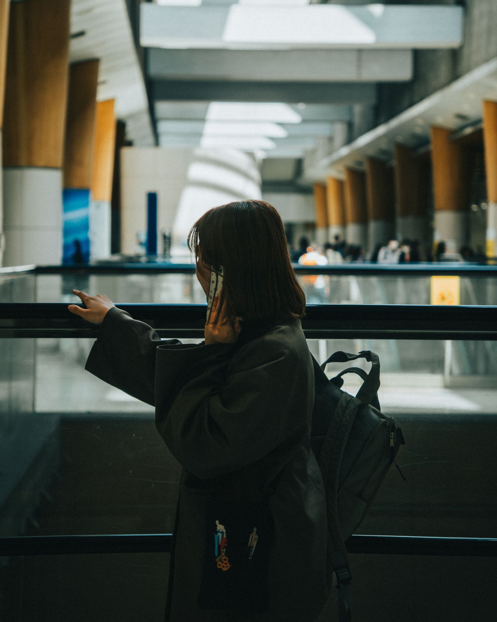 Traveler checking a phone before installing an eSIM at the airport