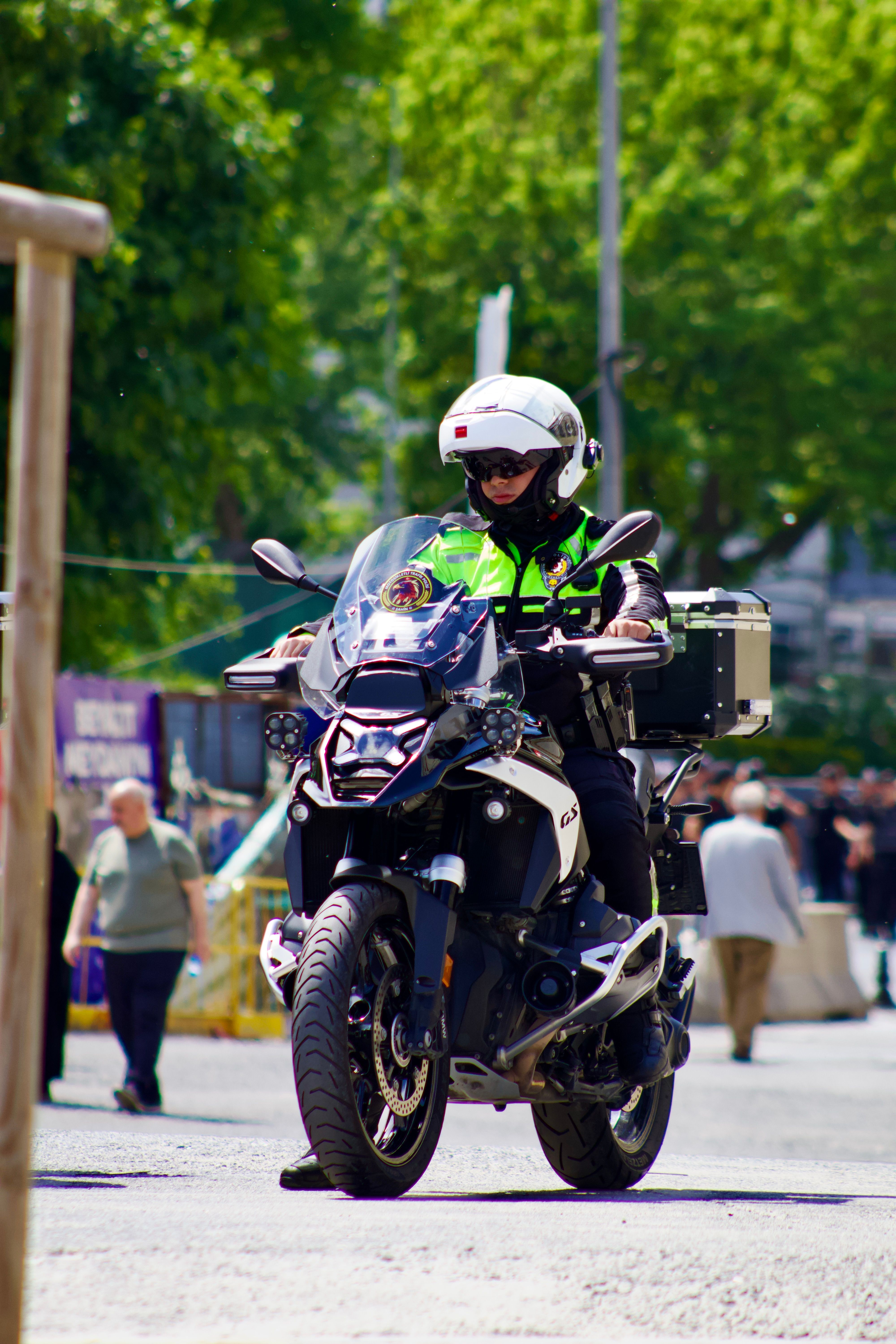 Motorcycle Police Officer on Patrol in City · Free Stock Photo
