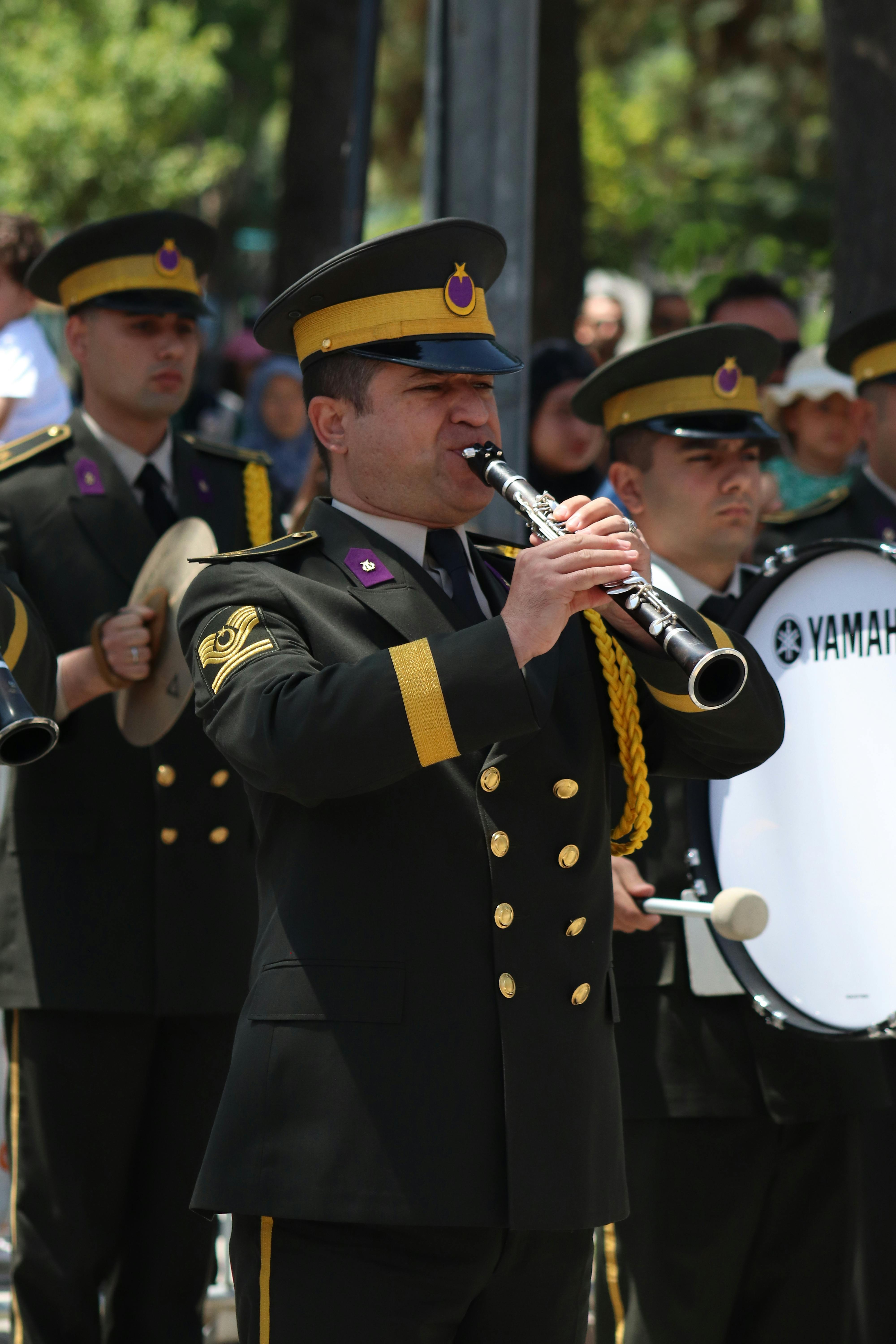 Drummer performing complex hybrid drum rudiments in a live setting