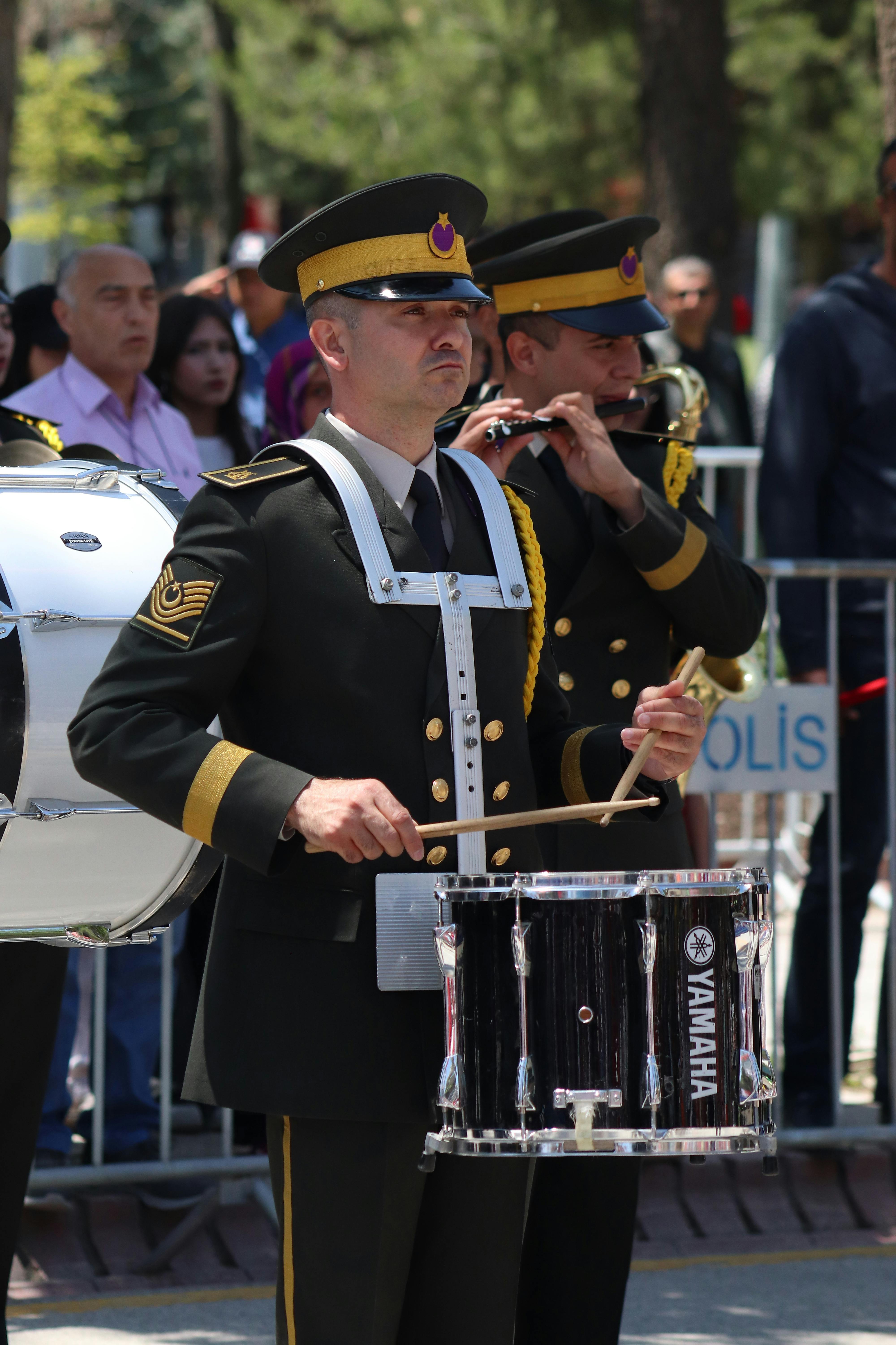 Drummer using a practice pad to learn hybrid rudiments