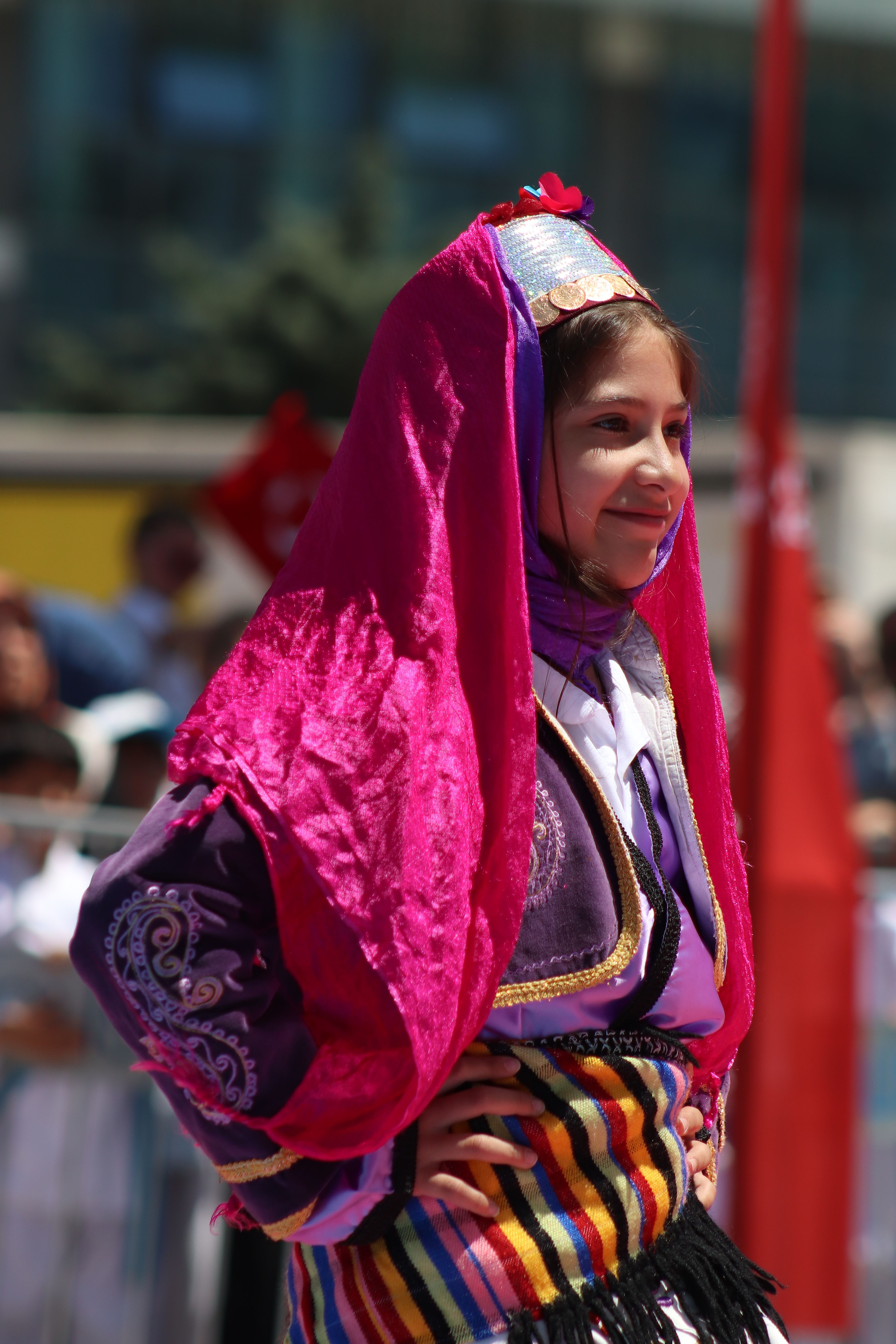 A young girl in traditional Turkish attire performing a folk dance in Malatya.