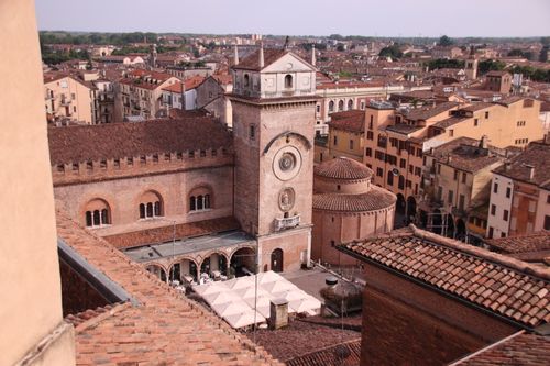 Free Aerial view of Rotonda di San Lorenzo and historic buildings in Mantova, Italy, under a clear sky. Stock Photo