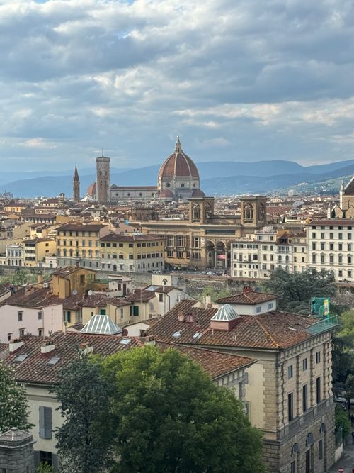 Free Scenic view of Florence with the iconic Duomo and historic architecture. Stock Photo