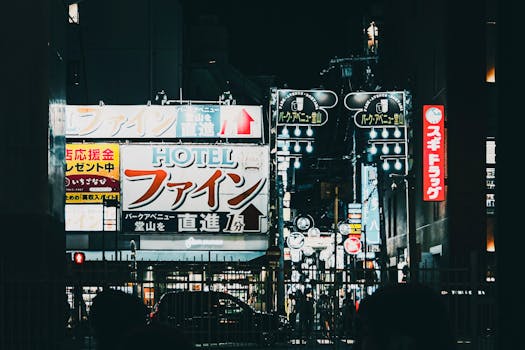 Explore the bustling neon-lit streets of Tokyo, Japan showcasing vibrant night life and city energy.