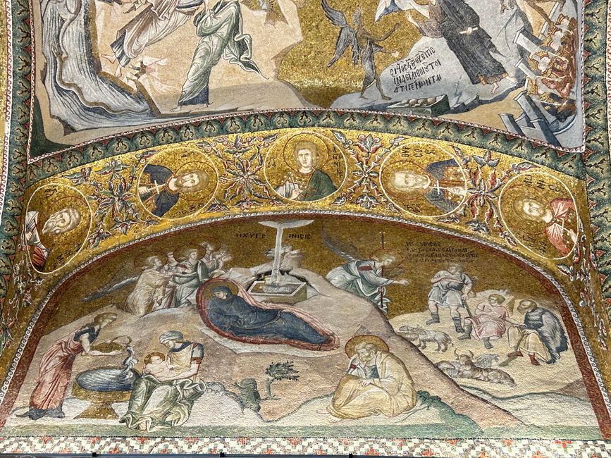 Beautiful Byzantine mosaic art depicting religious scenes in historic chapel.