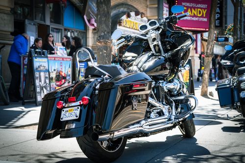Free A Harley Davidson motorbike parked on Fisherman's Wharf in San Francisco, capturing urban street life. Stock Photo