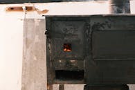 Rustic Metal Stove with Fire Inside