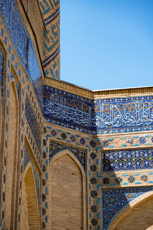 Free Stunning Islamic architecture with intricate blue tile patterns under clear sky. Stock Photo