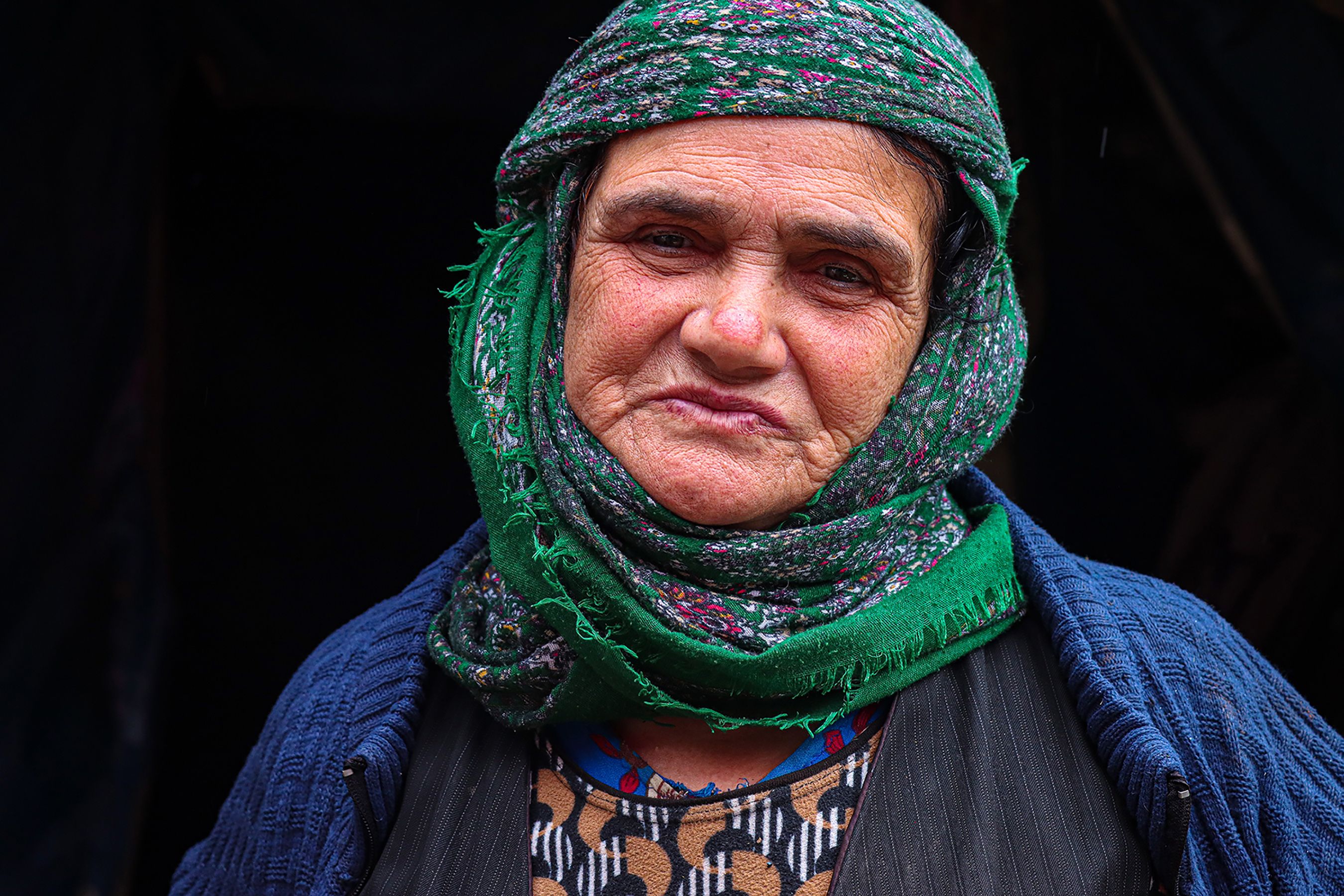 Portrait of Elderly Woman in Traditional Headscarf · Free Stock Photo