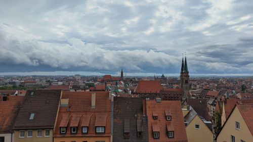 Free Explore Nuremberg's historic architecture beneath a moody, clouded sky. Stock Photo