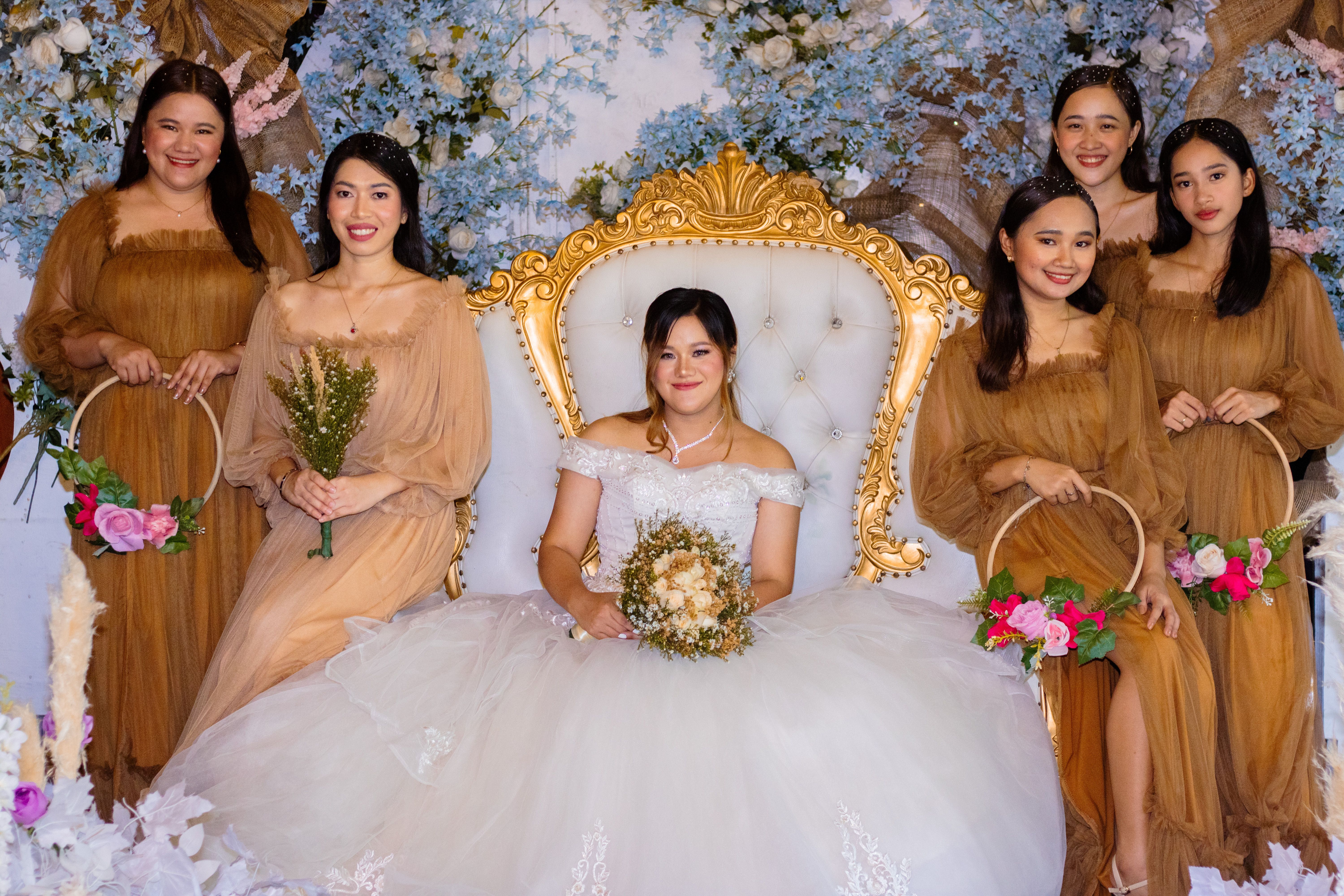 Happy Asian bride and bridesmaids in church  Free Stock Photo