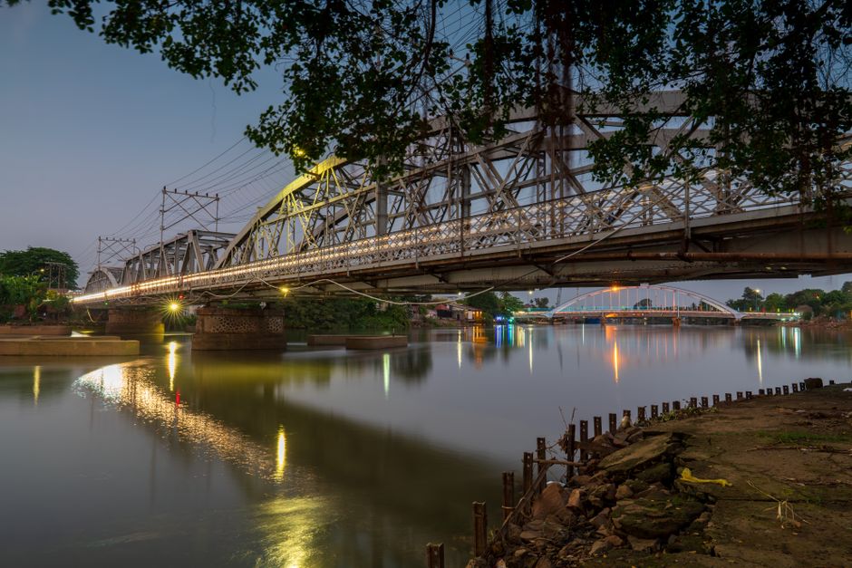 The iconic Bridge over the River Kwai in Kanchanaburi, Thailand
