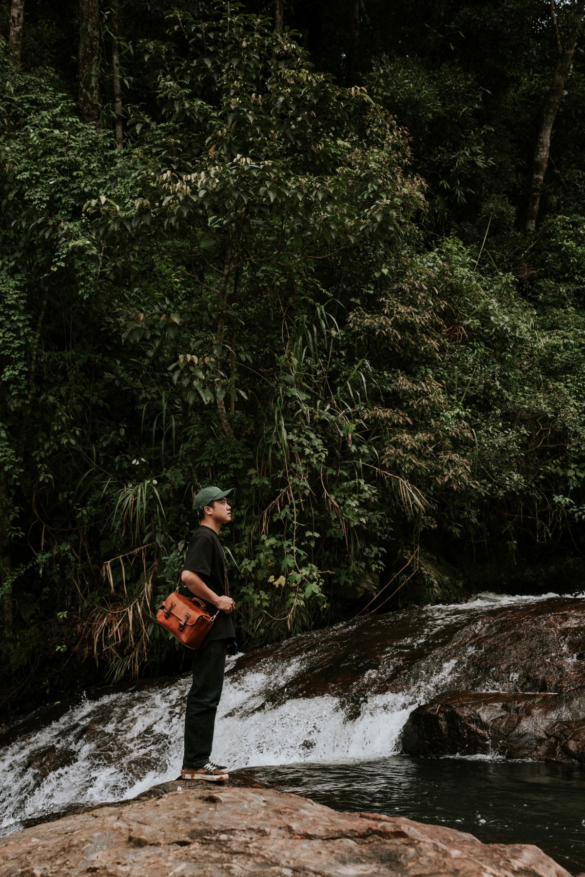 Traveler near a waterfall in Da Lat