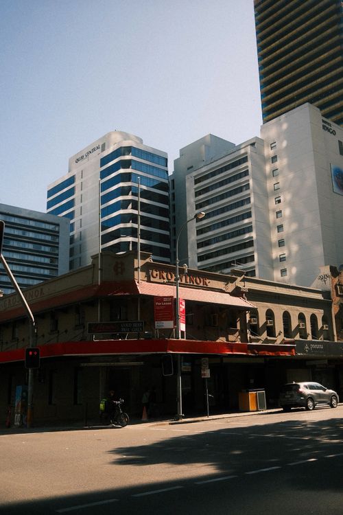 Free City street view with mix of modern skyscrapers and historic buildings. Stock Photo