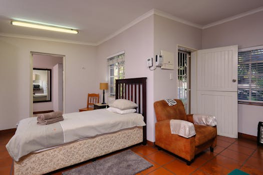 Inviting bedroom with modern furnishings in a cozy home setting, Pretoria.