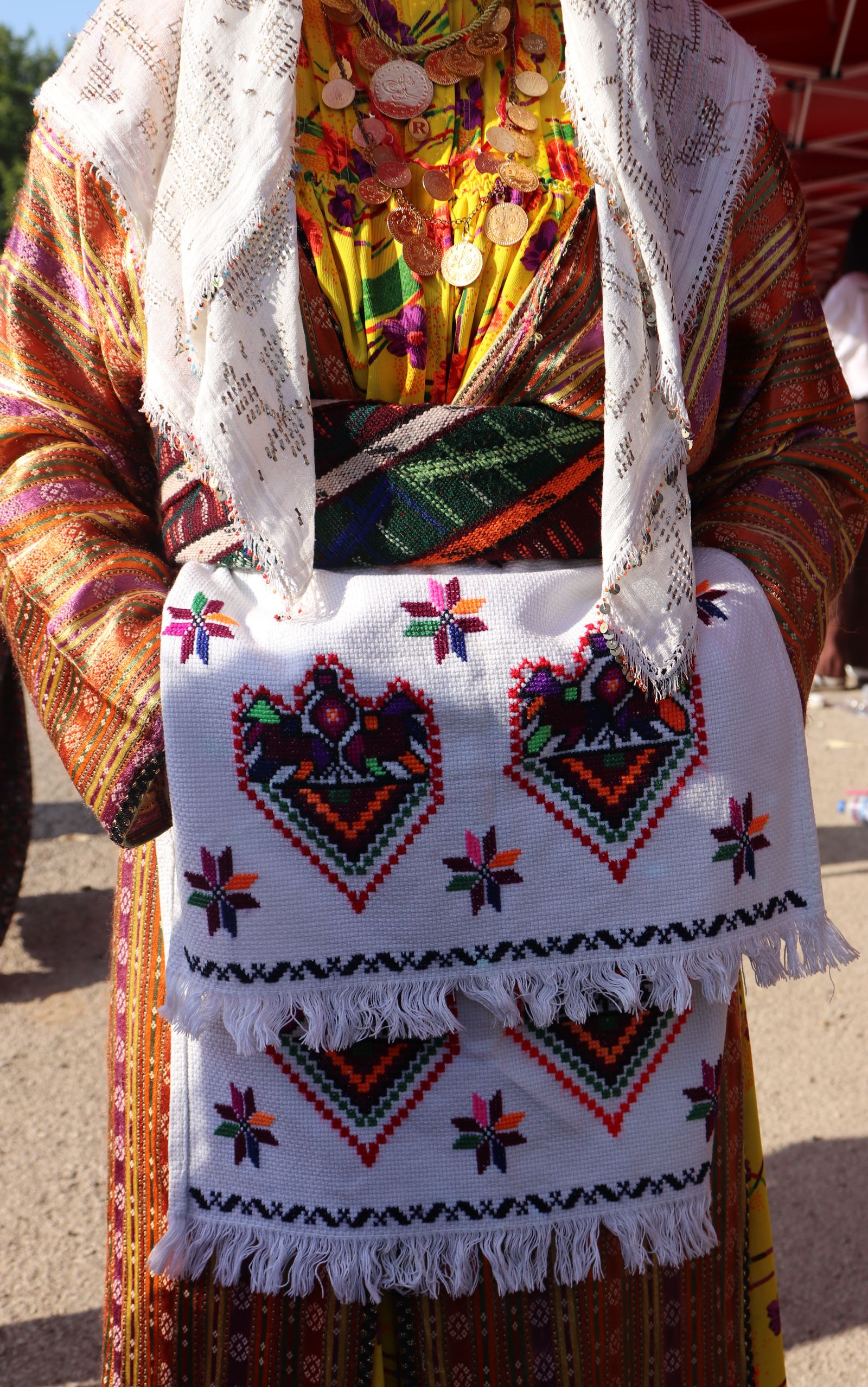 free-photo-of-traditional-embroidered-textile-display-outdoors.jpeg?w=1600