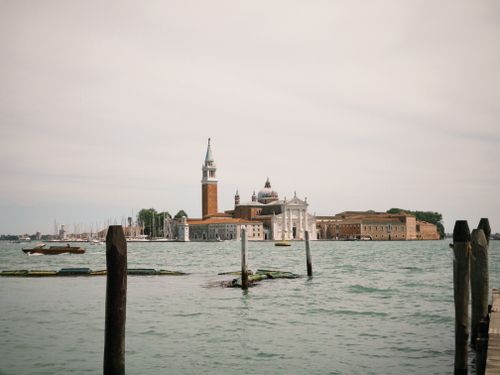 Free Stunning view of San Giorgio Maggiore in Venice, showcasing historic architecture across a serene waterfront. Stock Photo