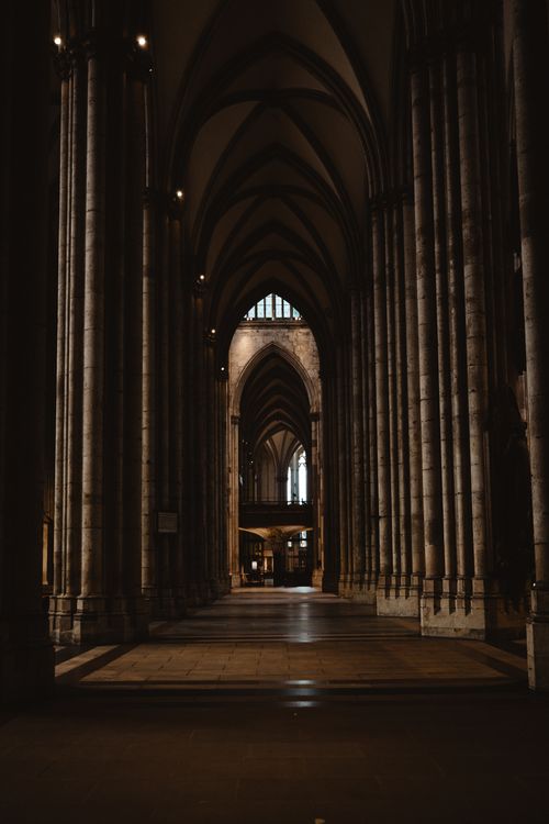 Free Majestic gothic arches inside Cologne Cathedral, capturing architectural brilliance. Stock Photo