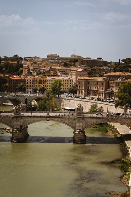 Discover the historic beauty of Rome's architecture alongside the tranquil Tiber River.
