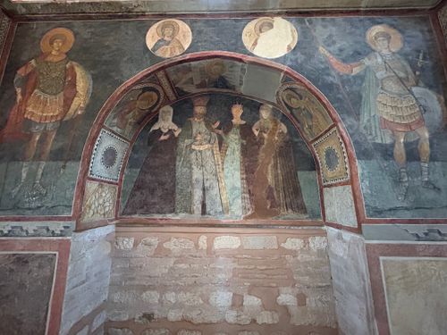 Free Colorful Byzantine fresco depicting saints and archangels in a historical chapel setting. Stock Photo
