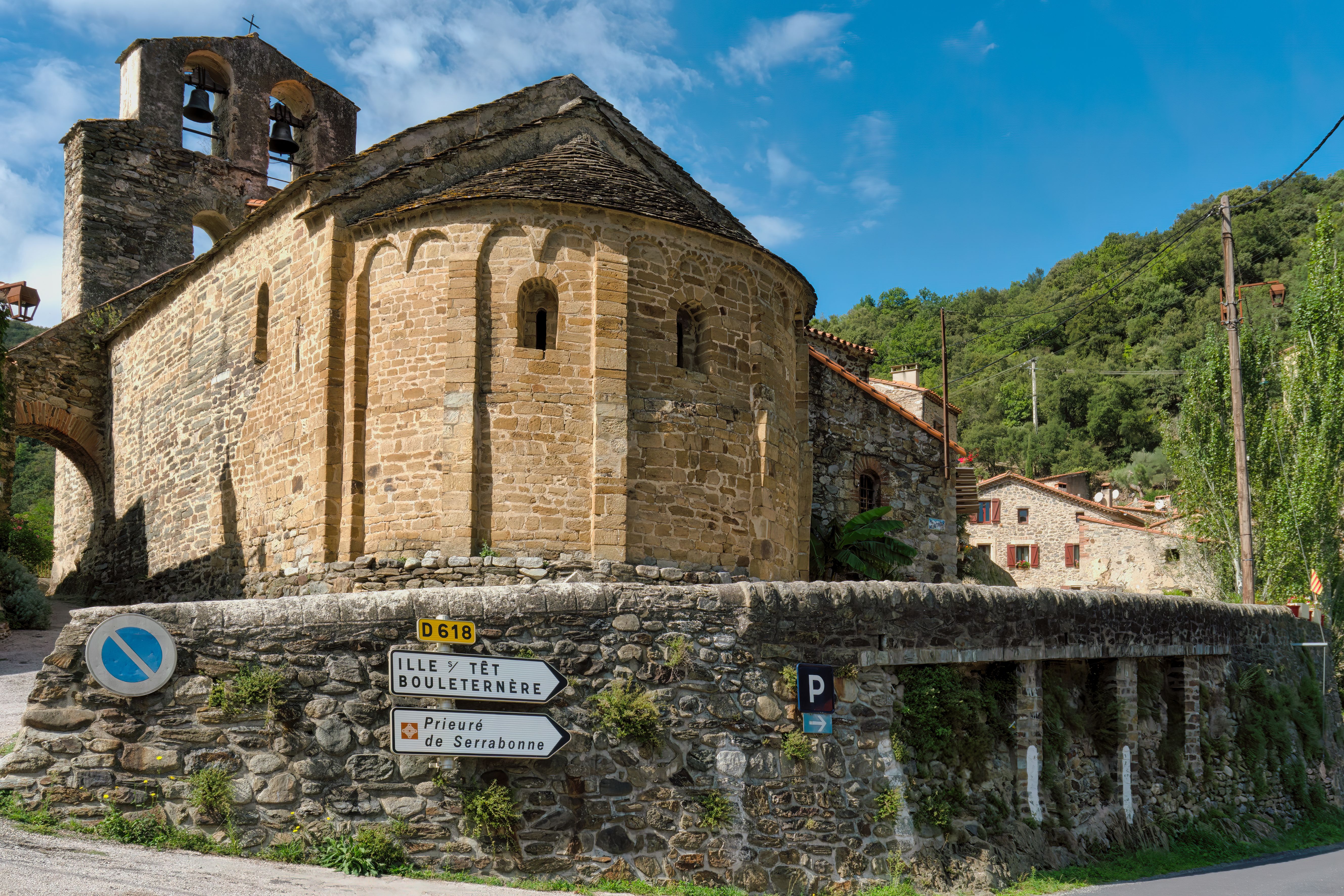 Explore the stunning medieval architecture of a historic church in Boule-d'Amont, France.