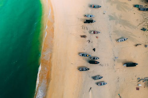 Aerial View of Row Boats on Seashore