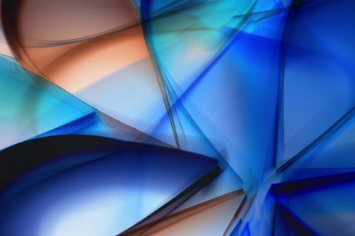 Free Vibrant abstract image with blue and orange hues, capturing dynamic motion and fluid shapes. Stock Photo