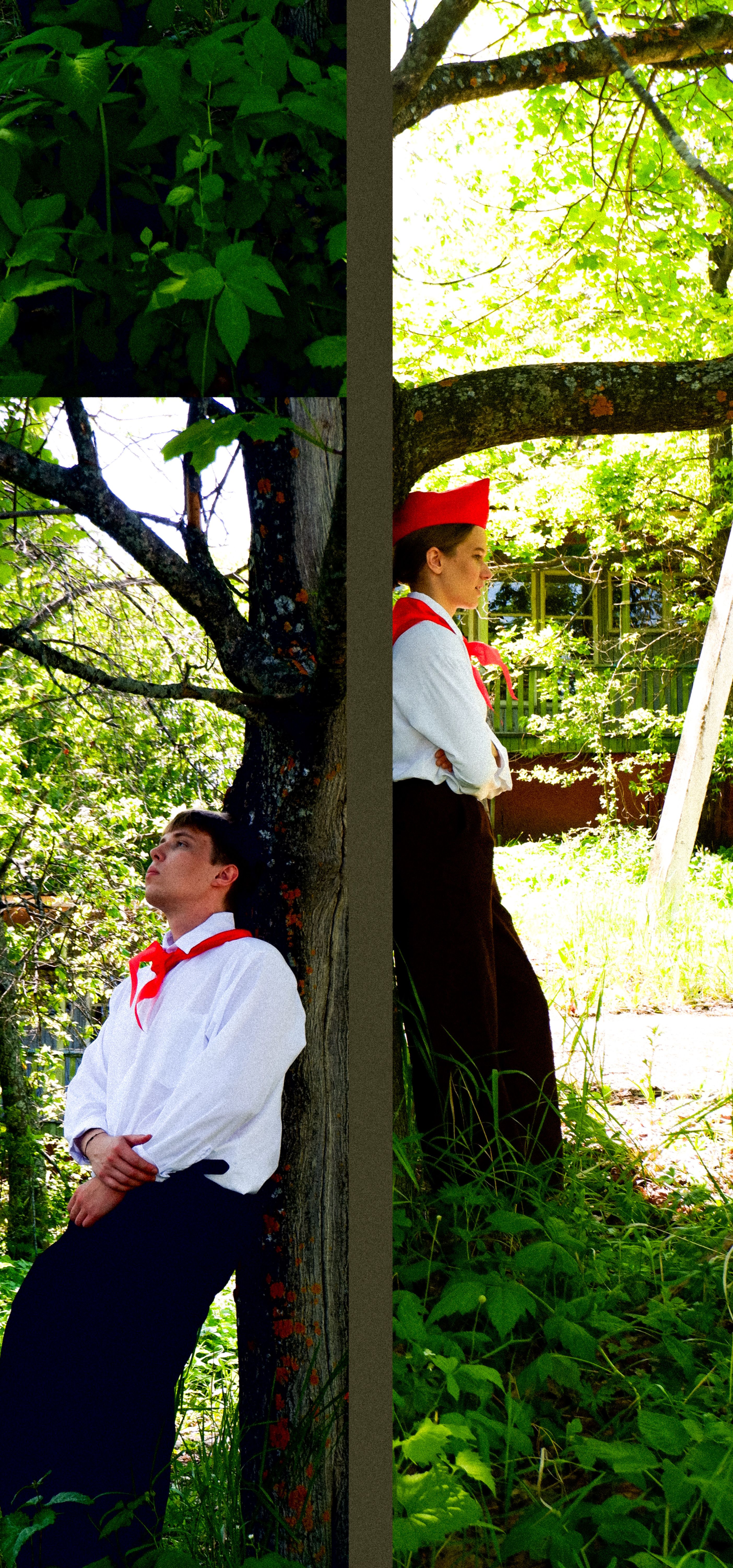 Two individuals in red uniforms relax under a tree outdoors in sunny weather.
