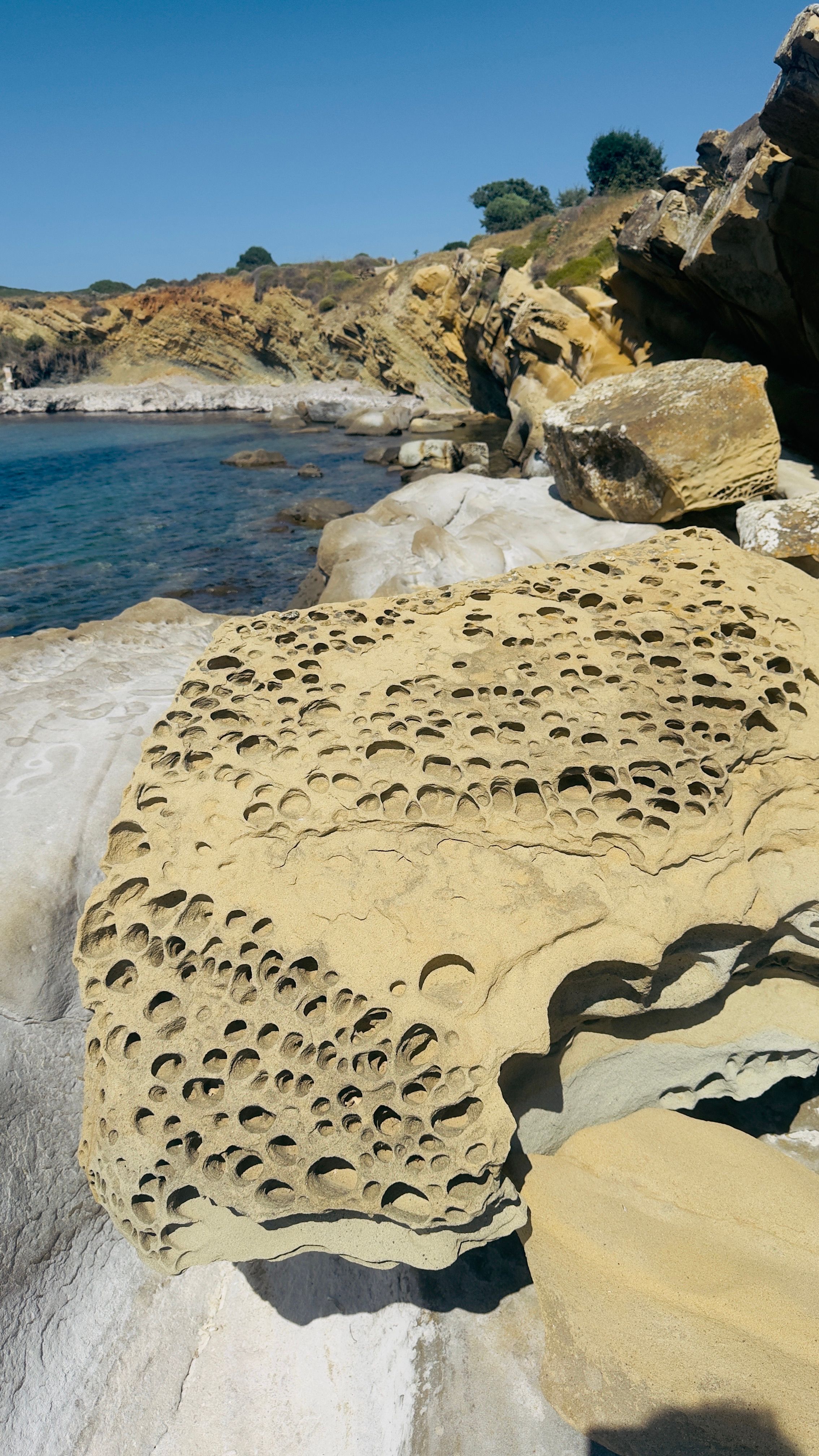 Eroded Coastal Rock Formation in Sunny Scene · Free Stock Photo