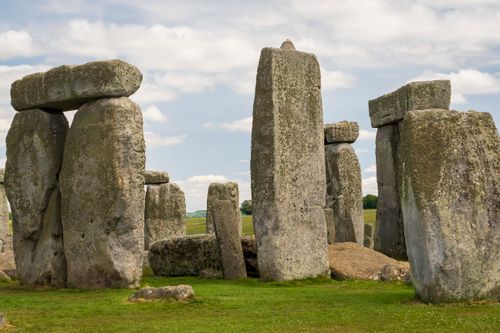Free A view of the ancient Stonehenge stones in England on a clear day, showcasing neolithic architecture. Stock Photo