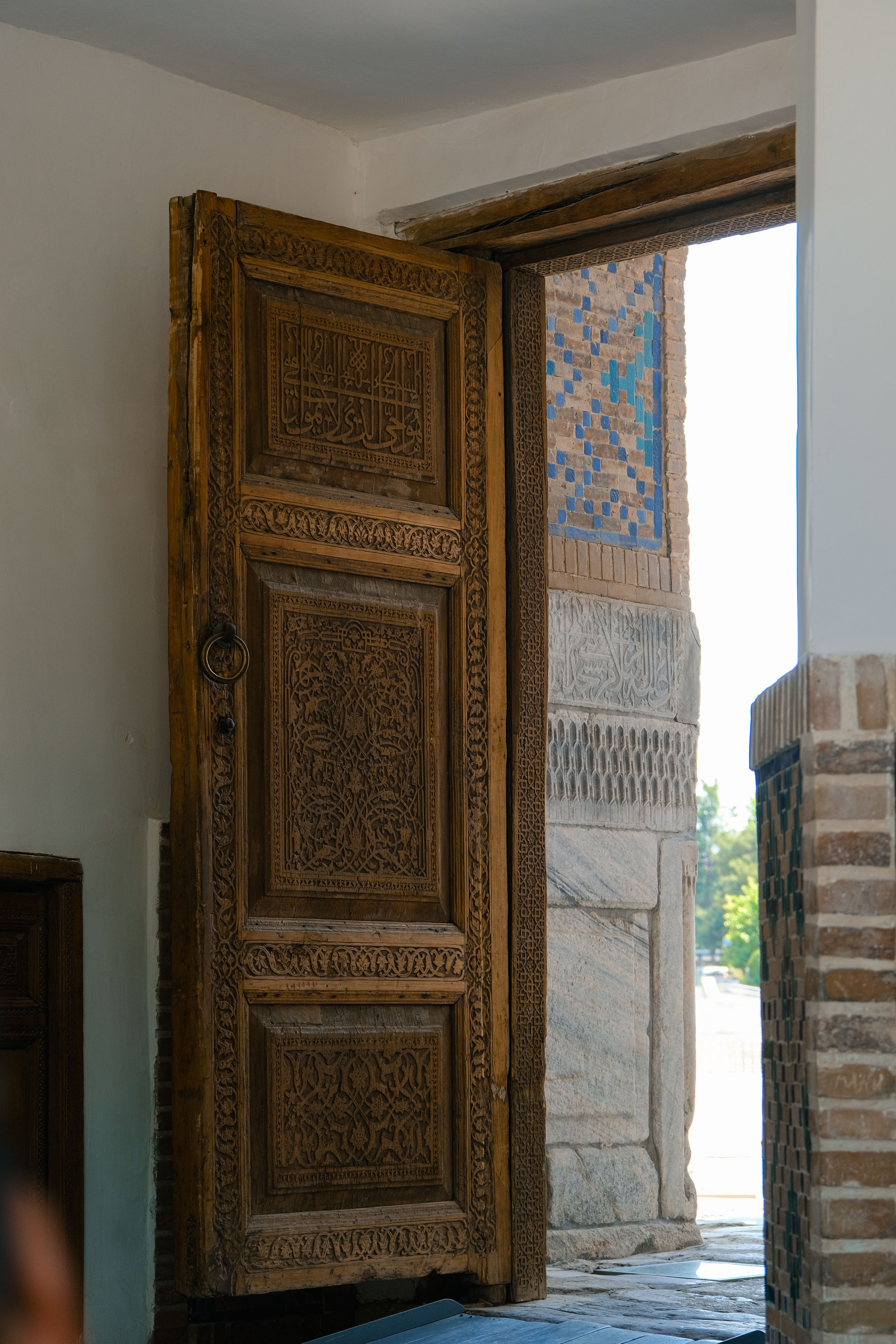 Ornate Wooden Doorway with Intricate Carvings · Free Stock Photo
