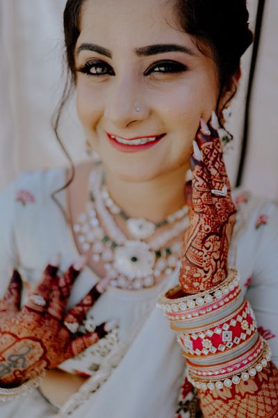 Bride portrait with henna and jewelry