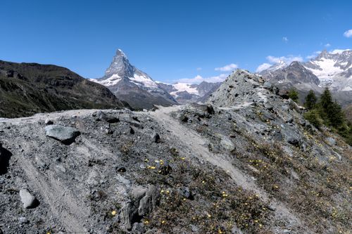Free Breathtaking summer view of the Matterhorn, captured in the Swiss Alps near Zermatt, showcasing rugged terrain. Stock Photo