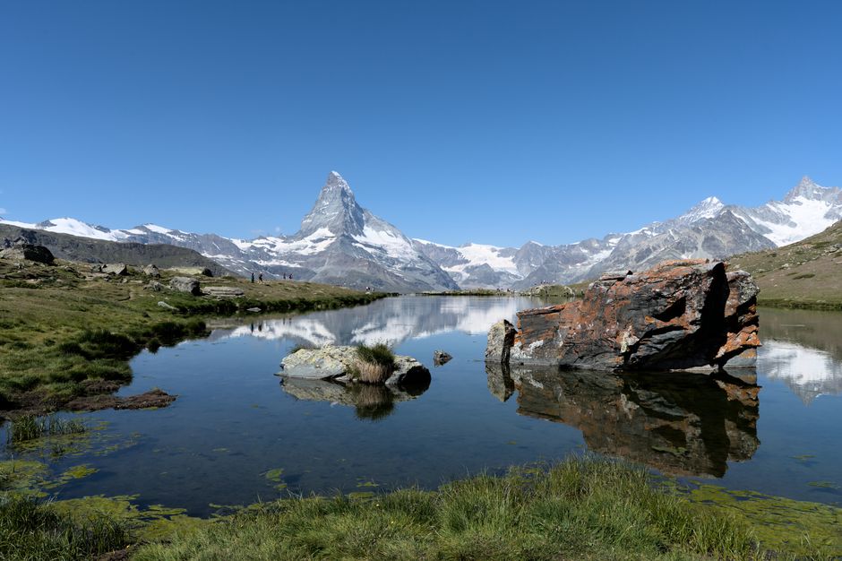 The Matterhorn reflected in an alpine lake above Zermatt