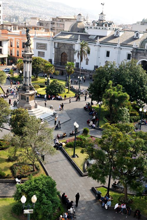 Free A lively aerial view of Plaza Grande, showcasing colonial architecture and vibrant urban life in Quito, Ecuador. Stock Photo