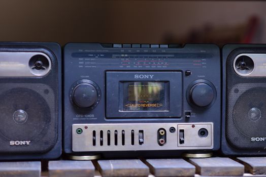 A classic Sony boombox with dual speakers, featuring auto-reverse cassette and radio functions.