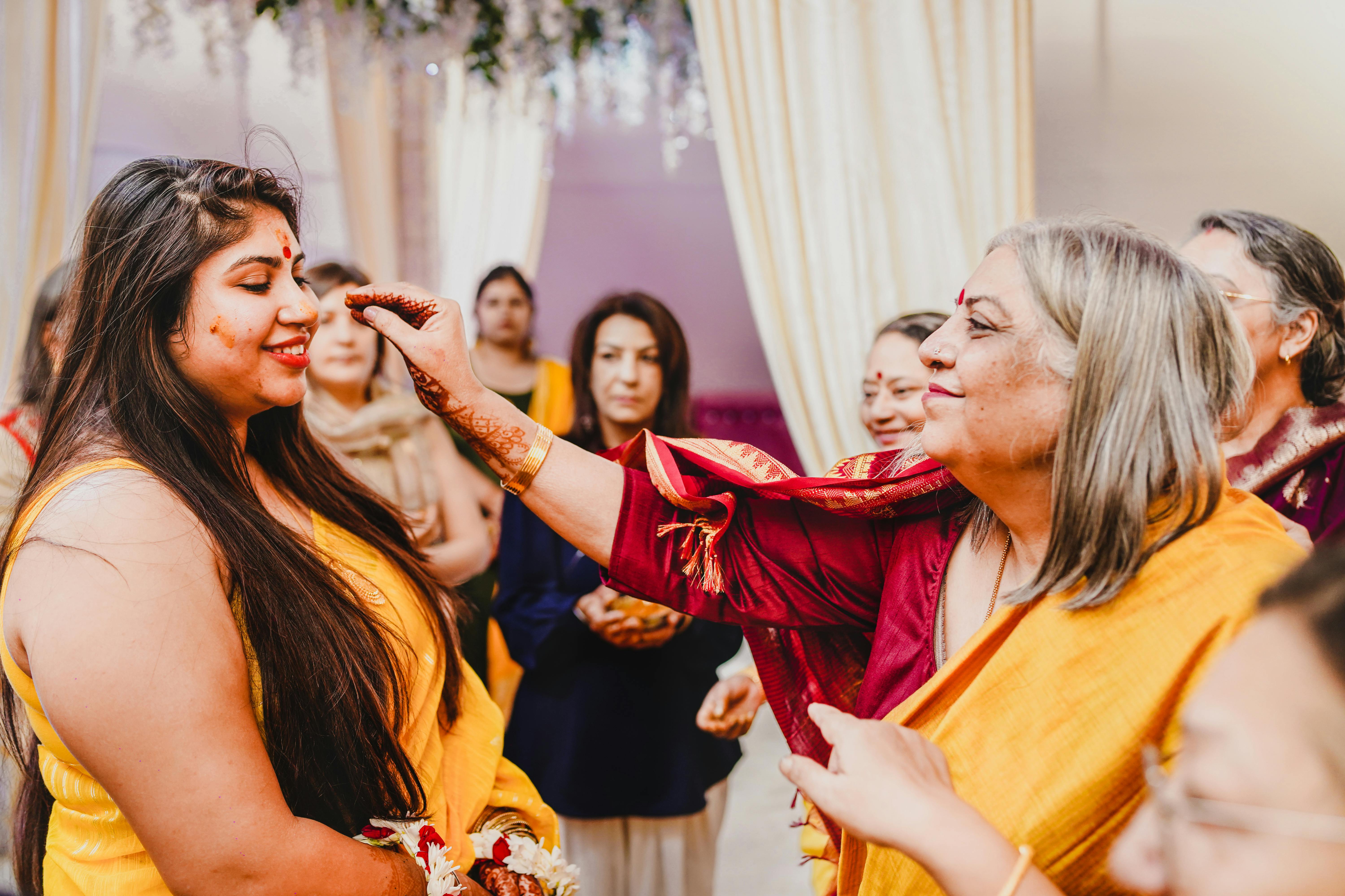Indian family gathered together discussing marriage arrangements representing traditional matchmaking culture