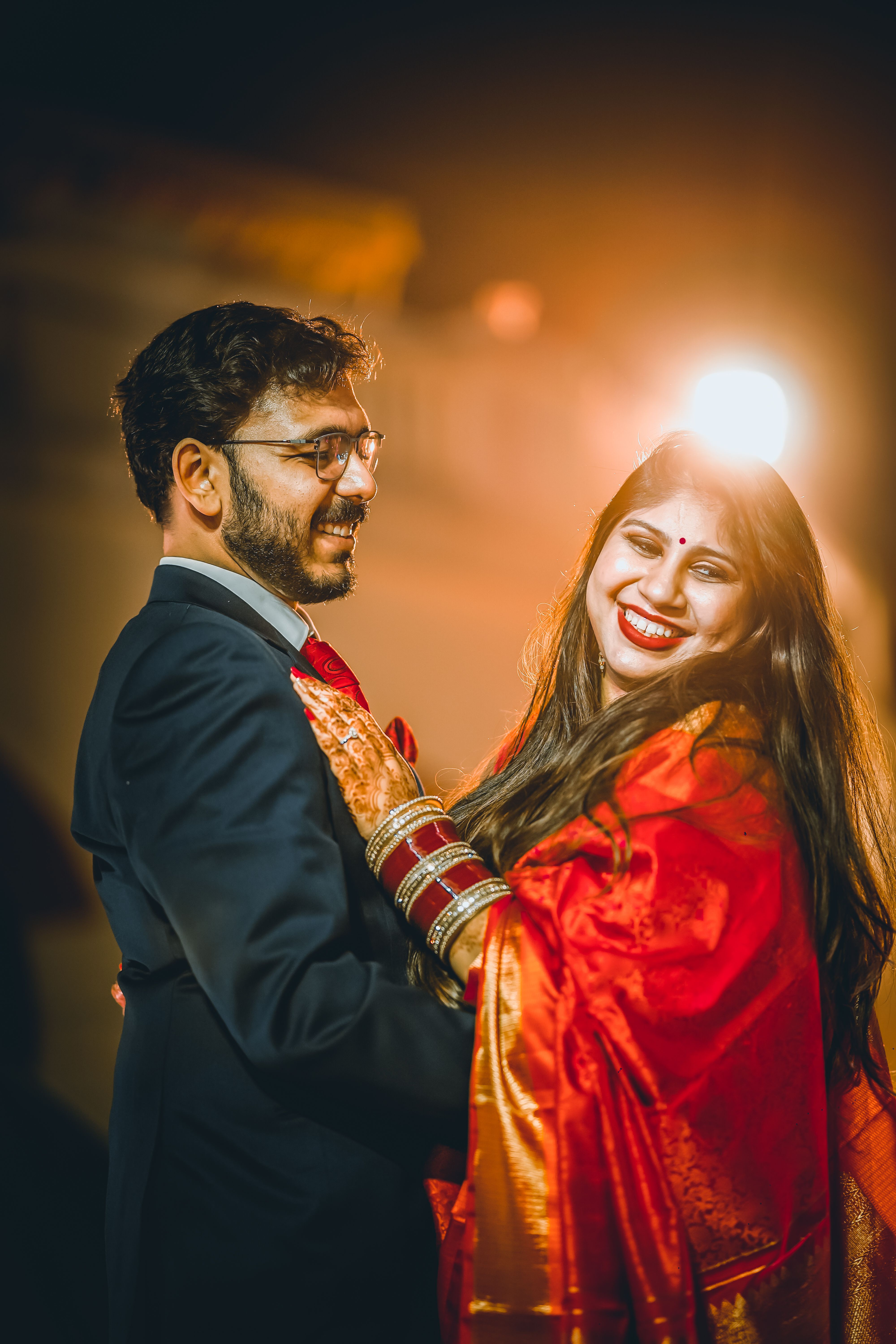 Elegant Indian Wedding Couple Smiling Outdoors · Free Stock Photo