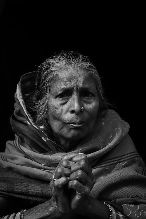 Monochrome Photography Of An Old Woman