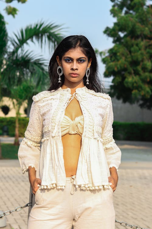 Photo Of Woman Wearing White Top