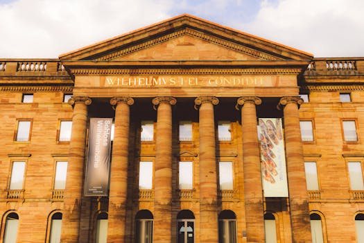 Front view of Wilhelmshöhe Castle in Kassel, Hessen, Germany, showcasing neoclassical architecture.