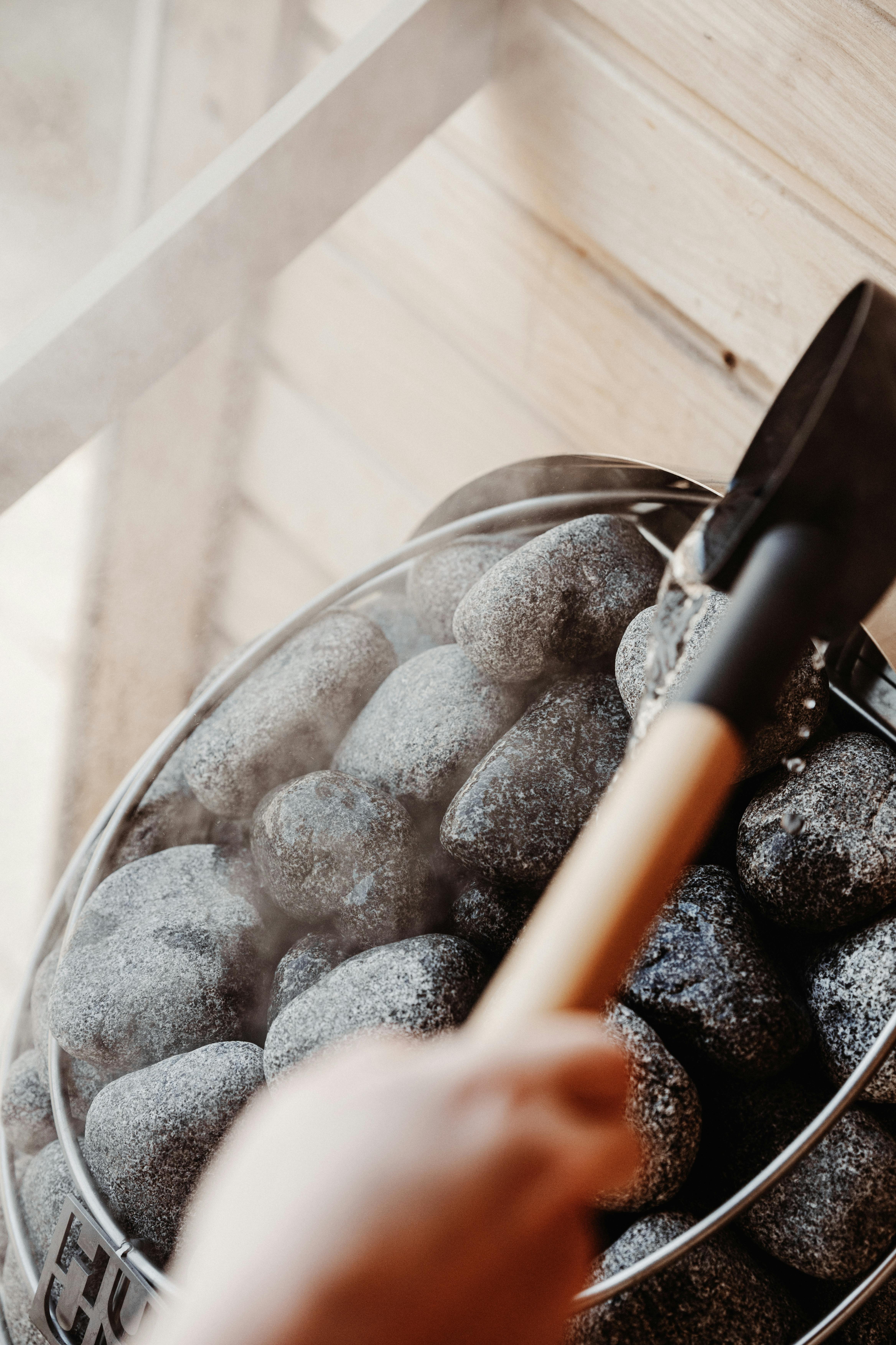 Warm steam rising from sauna stones