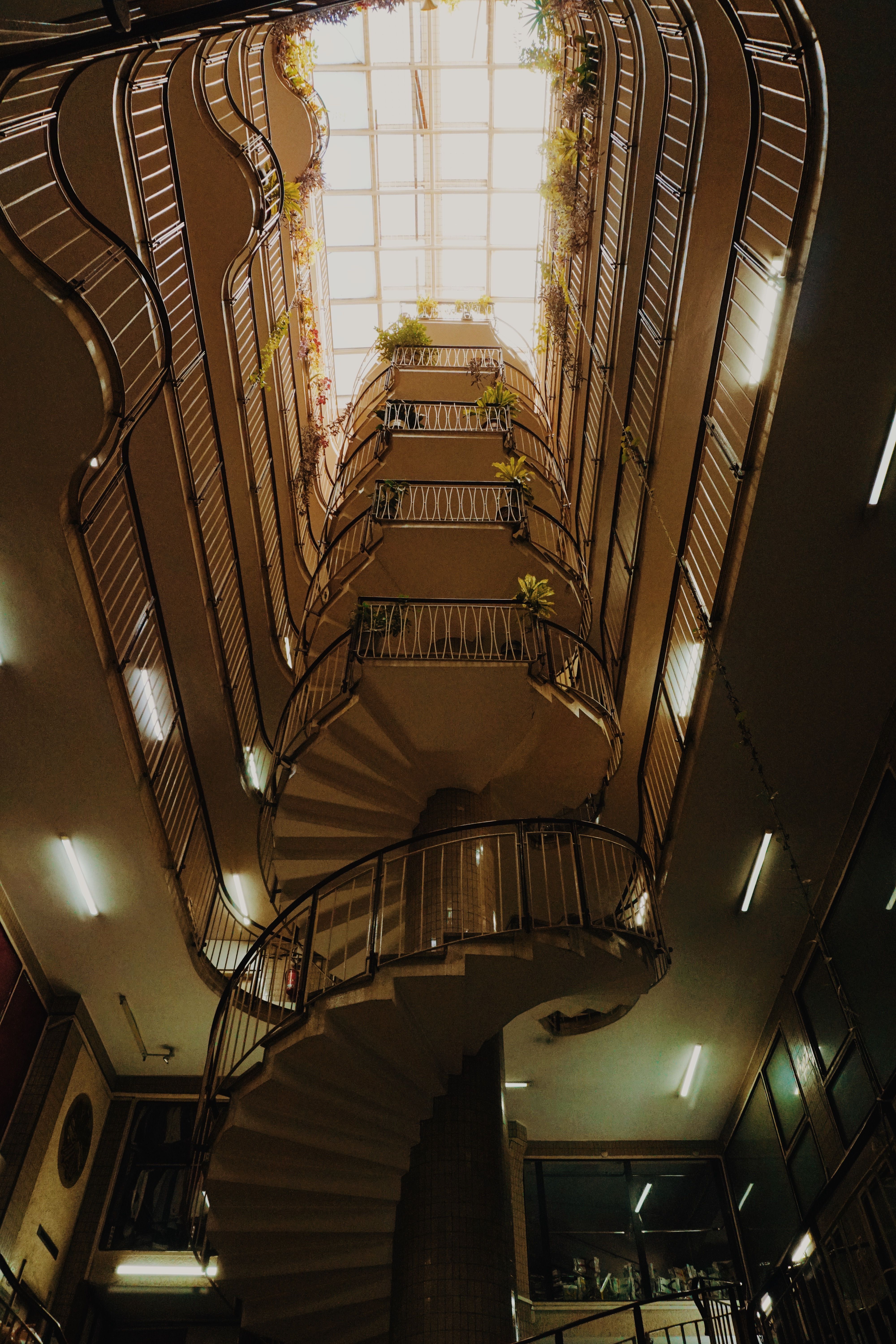 Spiral Staircase in Urban Atrium with Skylight · Free Stock Photo