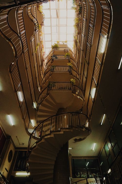 Spiral Staircase in Urban Atrium with Skylight · Free Stock Photo