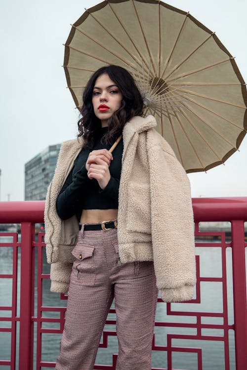 Photo Of Woman Holding Umbrella