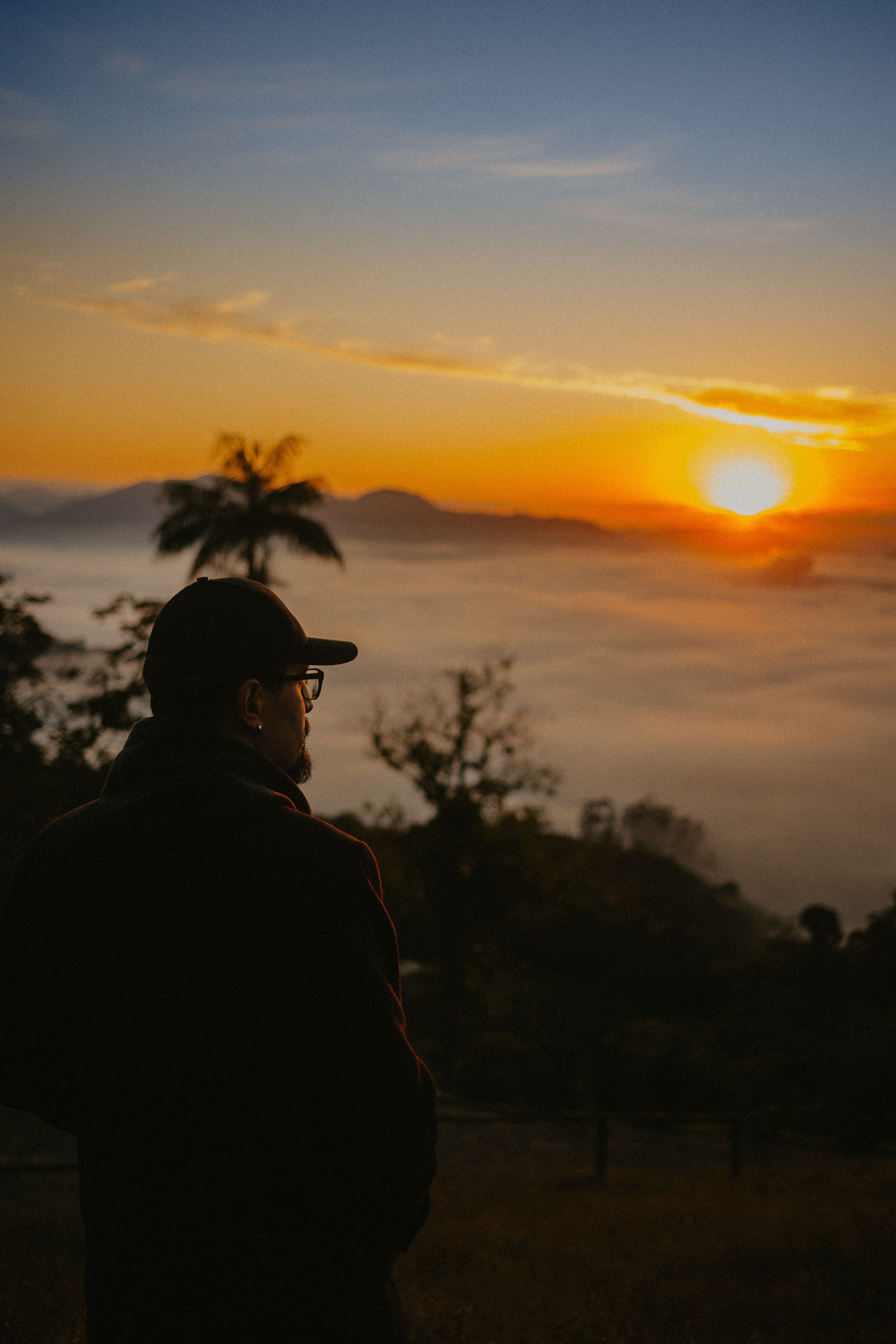 Serene Sunrise Over Misty Mountain Landscape · Free Stock Photo
