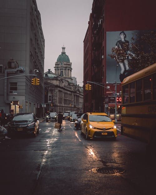 Free Low Angle Shot Of The City Street Traffic At dusk Stock Photo