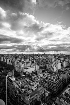 Stunning aerial black and white photograph showcasing Buenos Aires cityscape with dramatic clouds.