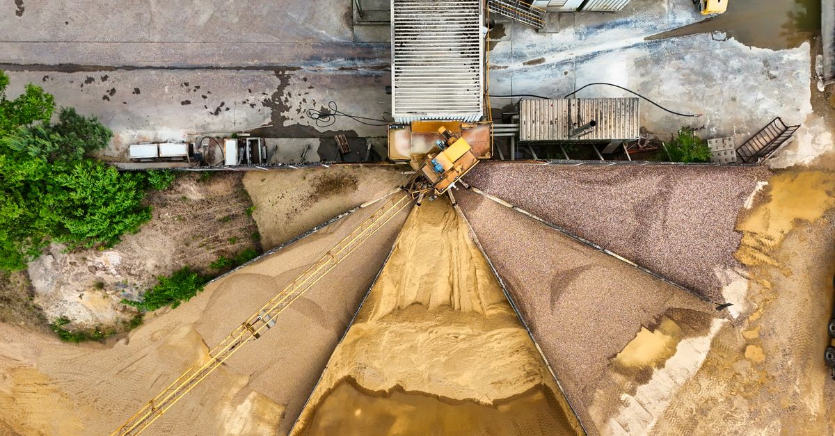 Aerial shot of sand and gravel processing plant in operation.